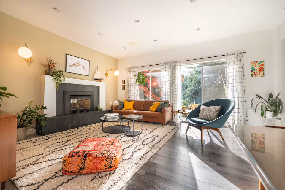 The living room, with the gas fireplace and sliding doors onto the patio